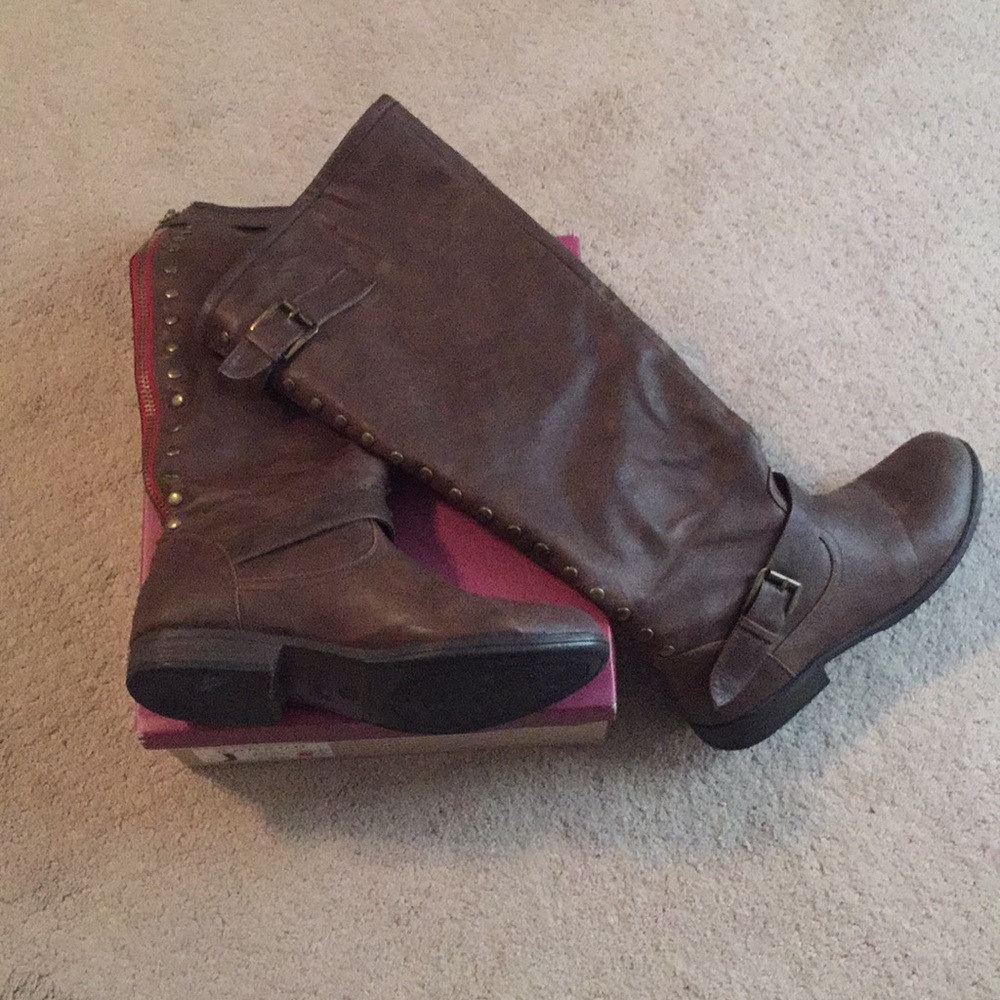 Tall brown riding boots